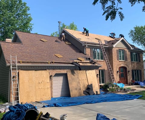 Shingle roofing replacement after hail damage